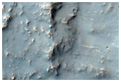Layered Ejecta and Rays of 5-Kilometer Diameter Crater Near Ophir Catenae