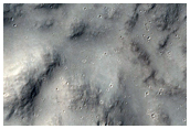 Distal Ejecta of 2-Kilometer Diameter Rayed Crater in Terra Cimmeria