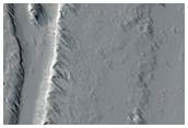 Source for a Sinuous Channel in Tharsis Montes