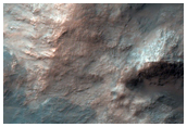 Central Peak of 70-Kilometer Diameter Impact Crater in Terra Sabaea