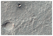 Cross-Cutting Ridges in Bosporos Planum