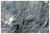 Well Exposed Deep Bedrock in Northern Hellas Planitia