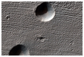 Rimless Pits in Reull Vallis Fill Material