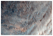 Exposure of Layered Bedrock on Northern Floor of Hellas Planitia