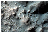 Central Structures of an Impact Crater in Terra Sirenum