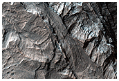 Isolated Layered Mound in Trough Between Layered Benches in Terby Crater