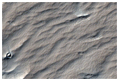 Pits in Gordii Dorsum