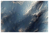 Light-Toned Layering in Noctis Region Pit