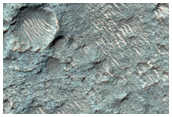 Infrared Bright Crater Floor with Low Albedo in Hesperia Region