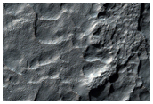 Fretted Terrain-Like Apron Material East of Hellas Planitia