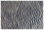 New Dark Spot in the Phlegra Montes