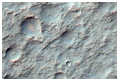 Well-Preserved 30-Kilometer Diameter Impact Crater with Bedrock Exposures