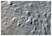 Ridges and Fill Material Among Knobs on West Flank of Arsia Mons