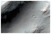 Stripped Mantle and Olivine-Rich Crater