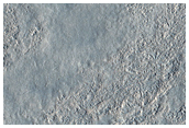 Alternating Bands of Boulders on Apron Material