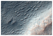 Cross-Cutting Wrinkle Ridges in Hesperia Planum