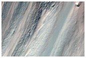 Possible Clays in Wall of Crater near Ganges Chasma