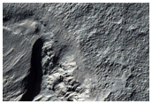 Profile View of Mantling Material in Gullied Crater