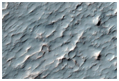 Possible Aluminum-Rich Crater Floor in Sirenum Region