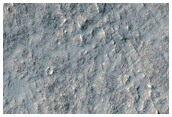 Layered Rocks on Floor of Large Ancient Crater