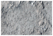 Amazonis Planitia and Crater with Wind Streak