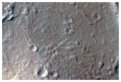 Odd Channels on Crater Rim and Linear Feature on Floor
