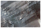 Small Cones in Older Lava Plains of Tharsis Region