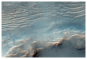 Crater and Ejecta Blanket in Far North Hesperia Planum