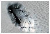 Chain of Dust-Filled Pits on Arsia Mons