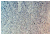 Crater in Northern Plains with Possible Olivine Signature
