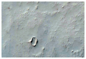 Flow Deposits on Floor of Large Noachian Crater