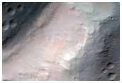 Bedrock Exposed in Cluny and Globe Craters