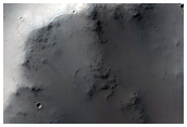 Impact Crater with Central Peak in Terra Cimmeria