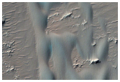Possible Evaporites on Floor of Unnamed Crater in Uzboi Vallis