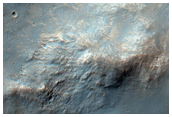 Possible Phyllosilicates in Crater Ejecta