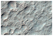 Well-Preserved 30-Kilometer Diameter Impact Crater with Bedrock Exposures