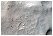 Well-Preserved Impact Crater on Floor of Flaugergues Crater