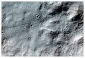 Layering and Flows Inside Southern Crater