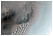 Crater in Tyrrhena Terra with Potential Phyllosilicates