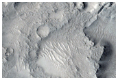 Central Uplift and Layered Materials on Crater Floor