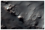 Well-Preserved 15-Kilometer Diameter Impact Crater Northwest of Hellas Plan