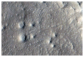 Galaxias Fossae and Adjacent Disrupted Terrain