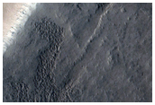 Heart-Shaped Pit in Acheron Catena Seen in MOC M02-01153