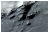 Crater Filled by Flow Ejecta From Nearby Crater