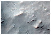 Layered Ejecta of 15-Kilometer Diameter Impact Crater in Terra Cimmeria
