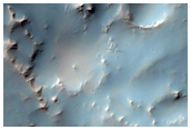 Bedrock Exposures in Walls and Terraces of an Impact Crater