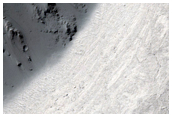 Flow Into Breached Crater in Central Elysium Planitia