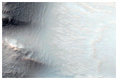 Well-Preserved 15-Kilometer Diameter Crater Northwest of Hellas Planitia