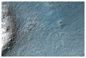 Butterfly Ejecta around a Fresh Crater