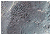 Crater on Rim of Valles Marineris